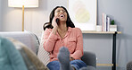 Phone call, laugh and woman in home for talking, happiness or comedy story with humor. Living room, funny and African person on mobile for conversation, gossip or chat with contact for joke on sofa