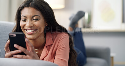 Buy stock photo Happy woman, relax or social media with phone on sofa for network service or app in home. Female person, user or lying with smile on mobile smartphone for internet, connection or online chat in house