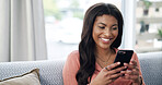 Girl, phone and happy for texting on couch, relax and contact on web chat for online dating at home. African woman, smartphone and smile with mobile app, meme or social network on sofa at apartment