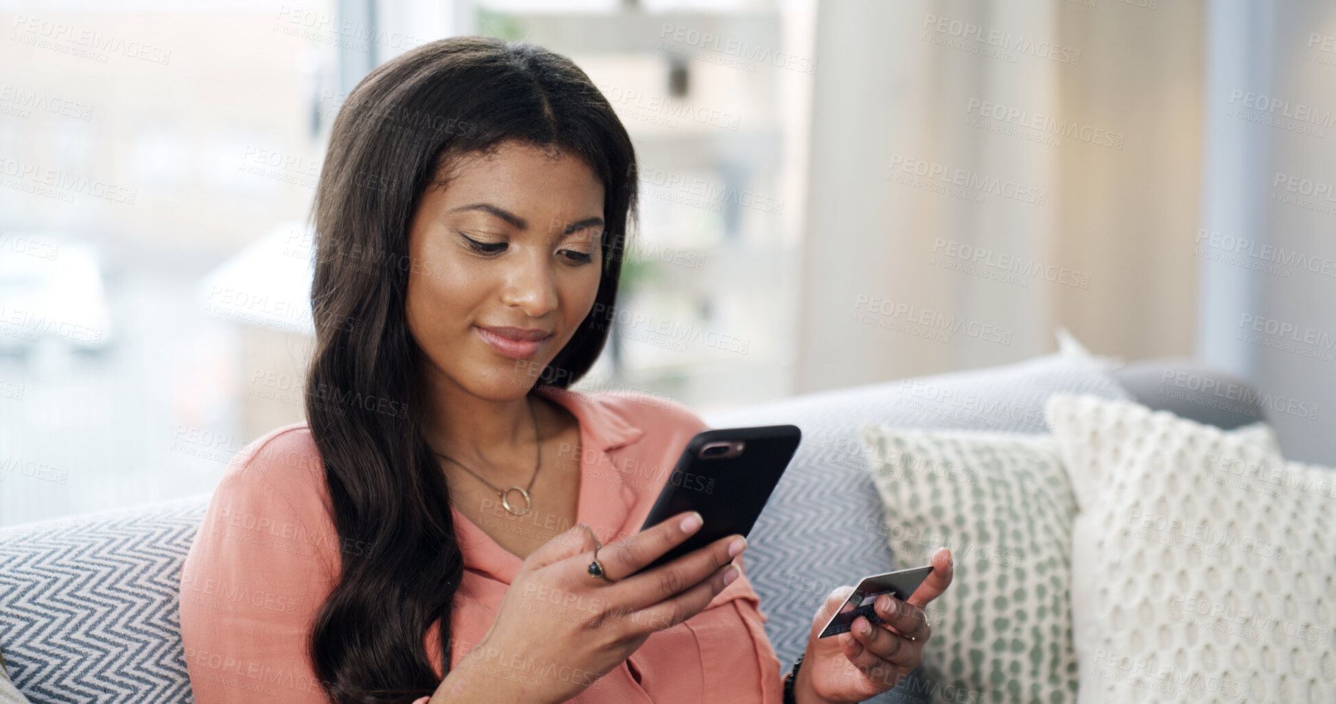 Buy stock photo Woman, phone and smile with credit card on sofa for online shopping, deal or easy payment in home. Person, smartphone and happy with e commerce, sale or bills on fintech app with banking at apartment