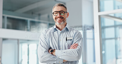 Buy stock photo Portrait, doctor and man in hospital, arms crossed and smile with confidence, career ambition and pride. Mature person, medical service and professional in clinic, healthcare and medicare facility