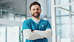 Portrait, nurse and man in hospital, arms crossed and pride with confidence, career ambition and uniform. Happy person, medical service and professional in clinic, healthcare facility and smile