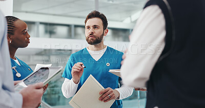 Buy stock photo Man, nurse and talking to staff in hospital for planning, medical report and surgery schedule. People, listening and folder for healthcare, operation feedback and patient charts for treatment results