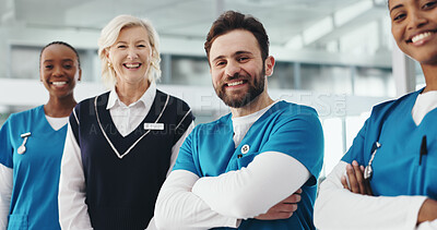 Buy stock photo Medical staff, man and group portrait in clinic for healthcare support, medicare help and about us. Solidarity, doctor and nurses with arms crossed for hospital management, collaboration or integrity