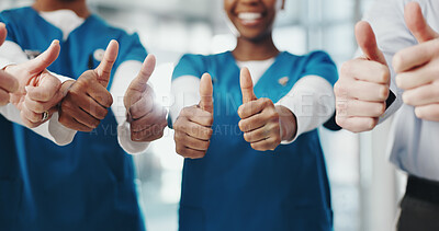 Buy stock photo Healthcare, teamwork and group of people with thumbs up, hands together and collaboration in hospital. Winning, approval and medical employees in solidarity for help, support and ok gesture and smile