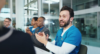 Buy stock photo Man, nurse and applause with celebration at meeting, team or congratulations for promotion at clinic. People, medical staff and happy with group, motivation or excited for goals in hospital boardroom