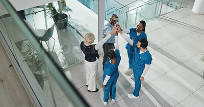 Buy stock photo Hands together, doctors and people at hospital in circle with partnership for healthcare services. Above team, nurse and surgeon in group high five with support, collaboration and meeting at clinic