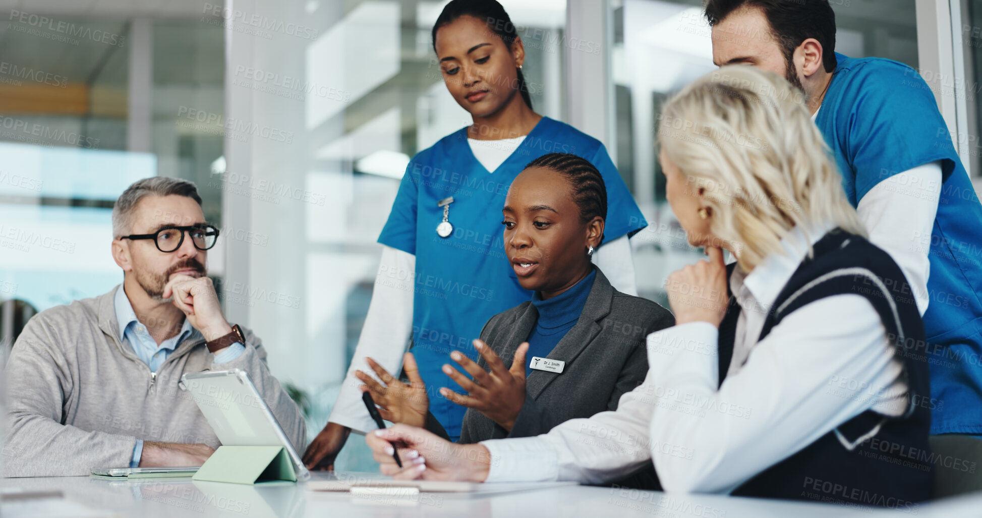 Buy stock photo People, nurses and tablet with team in office for planning, medical report and feedback on operation. Woman, staff and explain for healthcare, surgery schedule and brainstorming for hospital funding