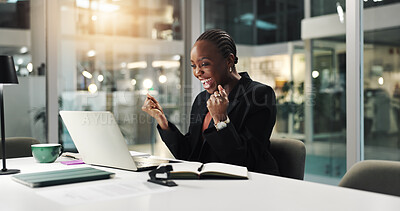 Buy stock photo Celebration, employee and black woman with laptop, office or positive feedback on email or overtime. Night, accountant and person with smile for achievement, success and job promotion in business