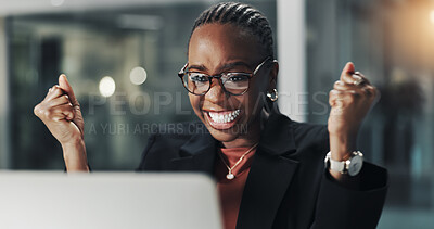 Buy stock photo Fist pump, happy and black woman in office at night with good news job promotion or investment. Excited, celebration and African female financial manager with laptop for budget report approval.