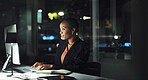 Black woman, typing and computer in office at night for research, editing article and feedback. Journalist, pc and report with story update, review newsletter and information on publication deadline

