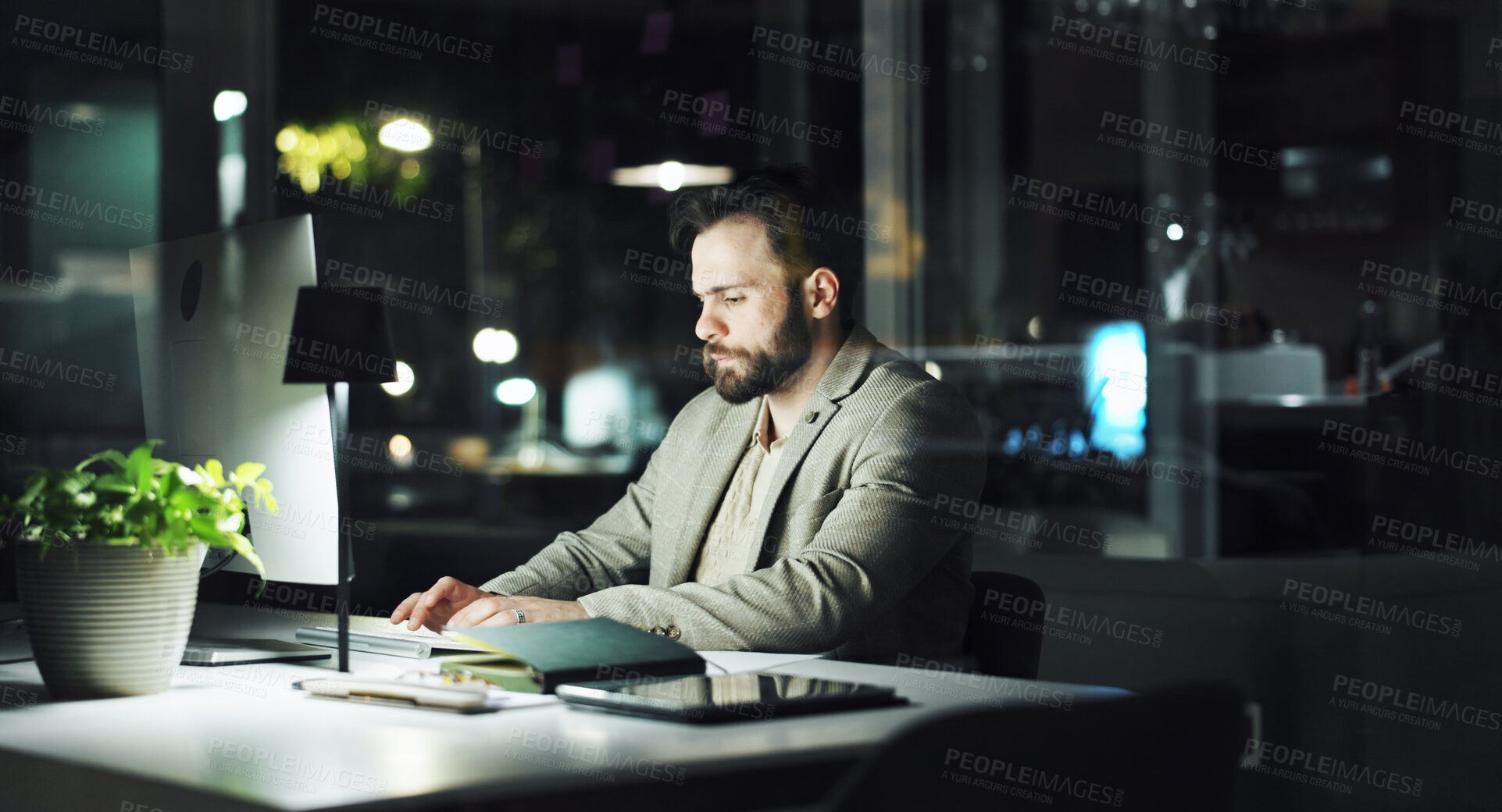 Buy stock photo Computer, typing and night with business man in office for planning, insurance broker and feedback. Portfolio analysis, research and overtime with person in agency for client application and review