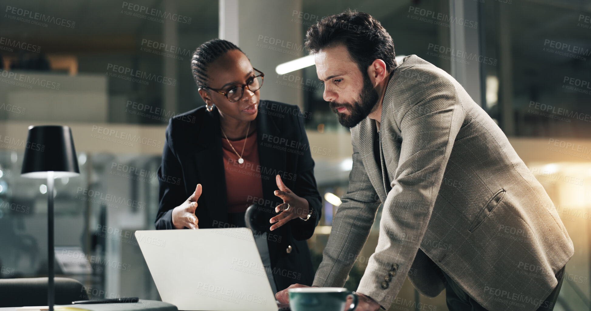 Buy stock photo Discussion, night and business people on laptop for review meeting, planning and proposal deadline. Corporate office, working late and woman with man on tech for research, budget and financial report