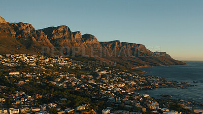 Buy stock photo Mountain, city and ocean with landscape of nature for travel, cityscape buildings and tourism holiday. Coastal, seascape and urban town with blue sky, vacation view and environment peace on getaway