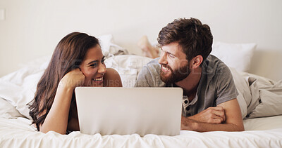 Buy stock photo Couple, laughing and relax with laptop in bed for streaming movie, funny series and lazy weekend. Bonding, people and happy with tech in home for watching comedy film, show subscription or connection