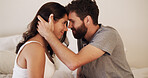 Forehead, love and security with couple in bedroom of home together for bonding, moment or safety. Connection, smile or trust with man and woman in apartment for anniversary, honeymoon or romance