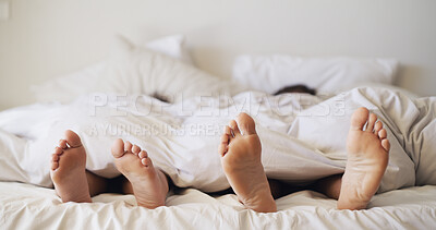 Buy stock photo Feet, home and couple sleeping in bedroom for rest, peace and blanket for comfort in morning. Barefoot, people and relax in bed together on mattress with nap, tired and break on weekend in house
