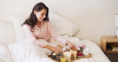 Buy stock photo Smile, relax and breakfast with woman in bedroom for room service, nutrition and hospitality. Happy, wake up and morning with person in bed of hotel accommodation for getaway, food and wellness