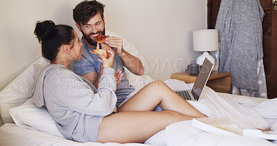 Buy stock photo Food, laptop and couple with pizza on bed watching movie, series or show together on weekend. Happy, home and man with woman for eating takeout meal with computer for streaming film in bedroom.