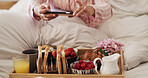 Phone, photography and hands of woman with breakfast in bed for hospitality, room service or meal in hotel. Cellphone, relax and person with morning food with picture for social media at holiday home
