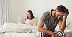 Frustrated couple, ignore and headache with stress for breakup, argument or disagreement in bedroom. Upset man, woman or toxic relationship with conflict for divorce, home dispute or cheating affair