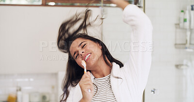 Buy stock photo Woman, toothbrush with singing and dancing in bathroom for fun, energy and morning routine. Dental care, grooming and female person brushing teeth with mic, music or dancer for hygiene in home