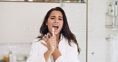 Buy stock photo Portrait, toothbrush and woman with energy, singing and dental health with music playlist. Home, oral care and person with fun, wellness and morning with results, start day and playful in bathroom
