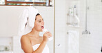 Woman, happy and singing in bathroom, home and grooming with shampoo with bottle for hair care. Girl, voice and music performance with morning routine, hygiene or inspiration with song at apartment