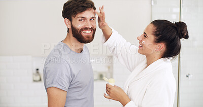 Buy stock photo Cream, skincare and smile with couple in bathroom of home together for moisturizing routine. Beauty, lotion and portrait with happy people in mirror at apartment for antiaging cosmetics or wellness
