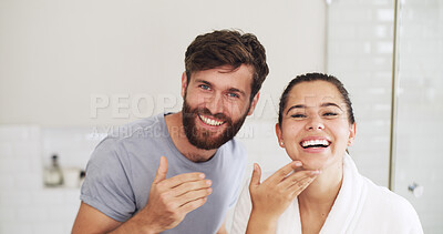 Buy stock photo Portrait, skincare and couple in bathroom, smile and cleaning with grooming, care and wellness. Treatment, home and man with woman, happiness or healthy skin with beauty, cosmetics or morning routine