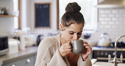 Buy stock photo Drinking, coffee and woman in kitchen, calm and warm beverage for caffeine boost, morning and house. Enjoying, tea and person with hot matcha for health benefits, peace or relax with cup in home