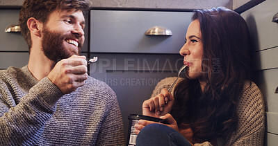 Buy stock photo Happy, couple and eating ice cream on floor with love, sharing dessert and bonding together. Smile, people and relax with sweet treats for romantic date, frozen snack and marriage commitment at house