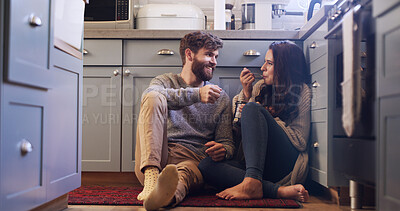 Buy stock photo Smile, couple and eating ice cream in kitchen for love, sharing dessert and bonding together. Happy, people and relax with sweet treats of romantic date, frozen snack and marriage commitment at house