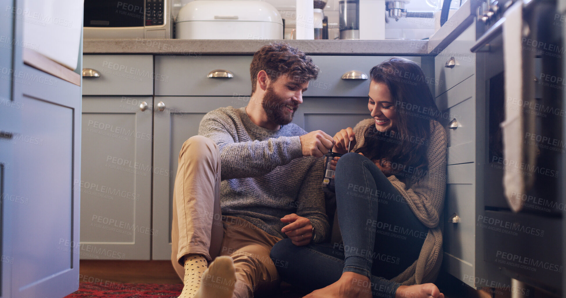 Buy stock photo Smile, couple and eating ice cream on floor with love, sharing dessert and bonding together. Happy, people and relax with sweet treat for romantic date, frozen snack and marriage commitment at house