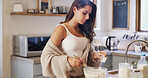 Woman, baking and mixture for breakfast at house for meal prep, healthy dessert and whisk ingredients. Female person, mixing and pastry process with organic recipe, nutrition brunch and homemade cake
