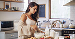 Woman, baking and batter for breakfast at house for meal prep, healthy dessert and whisk ingredients. Female person, mixing and pastry process with organic recipe, nutrition brunch and homemade cake