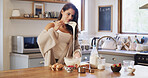 Woman, baking and whisk with mixture at house for meal prep, healthy dessert and ingredients. Female person, mixing batter and breakfast process for organic recipe, nutrition brunch and homemade cake