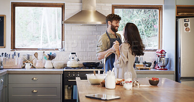 Buy stock photo Couple, dance and cooking in kitchen, home and holding hands with love, care or happy for bonding. Man, woman and connection with trust, food and ingredients for healthy nutrition with smile at house