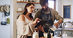 Couple, tablet and baking in kitchen with milk, online tutorial and instructions for recipe. Home, man and woman cooking with technology to mix ingredients, pour dairy or food guide for meal prep