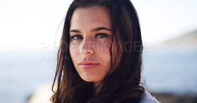 Buy stock photo Portrait, travel and woman at sea for holiday, summer trip and adventure in nature. Beach, tourist and serious person outdoor with confidence on vacation break at ocean on island in Australia