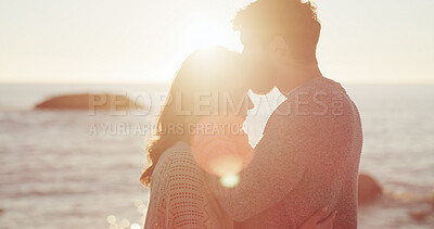 Buy stock photo Kiss, hug or couple at beach for sunset, valentines day and love in relationship together. Sea, embrace and people bonding on honeymoon holiday for romantic anniversary, vacation or travel lens flare