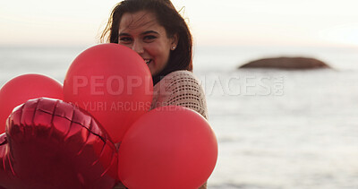 Buy stock photo Beach, celebrate and happy woman with balloons for love, present and romantic gesture. Red color, smile and female person at sea with inflatable gift for space, care and portrait on valentines day
