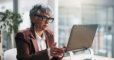 Buy stock photo Business, laptop and woman in office, online reading and creative agency with email. Mature person, employee and fashion journalist in workplace, PC and magazine editor with review and news report