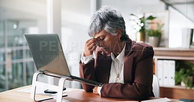 Buy stock photo Business, headache and woman in office, pain and laptop with stock market crash, stress or tension. Mature person, accounting or employee with PC, crypto error or migraine with fatigue and exhausted