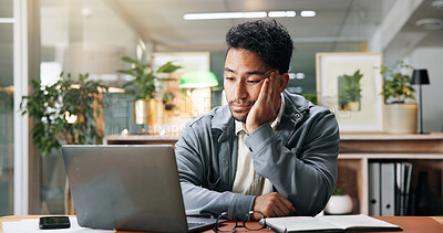 Buy stock photo Bored, laptop and reading with business man at desk in office for brain fog or mental fatigue. Computer, thinking and tired with exhausted employee at work for administration burnout or depression