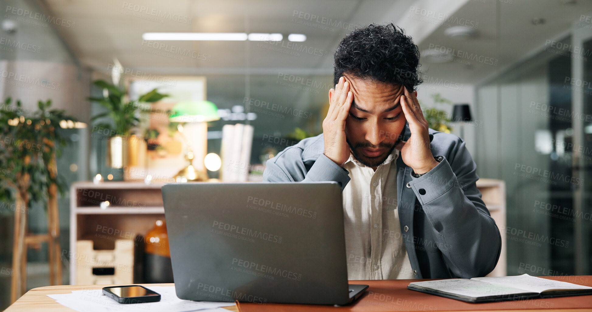 Buy stock photo Business, headache and man in office, night and laptop with stock market crash, pressure and tension. Person, accounting and employee with pc, overtime and migraine with pain, trading fail or fatigue