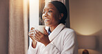 Coffee, happy and black woman by window in home for relax, calm or peaceful morning on weekend. Thinking, memory and African female person drinking cappuccino with reflection for break in house.