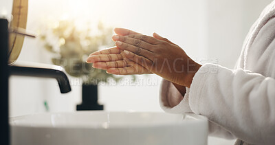 Buy stock photo Home, washing hands and woman in bathroom, faucet and routine with skincare, wellness and morning. Closeup, apartment and person with tap, lens flare and remove bacteria with hygiene and cleaning