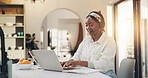 Laptop, happy and black woman in kitchen in home with remote work for creative project. Research, computer and African female editor with freelance job for online article publishing in apartment.