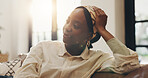 Relax, thinking and black woman in home with vision, inspiration or daydreaming with calm in morning. Living room, reflection and person with thoughts on sofa, idea or remember memory with peace